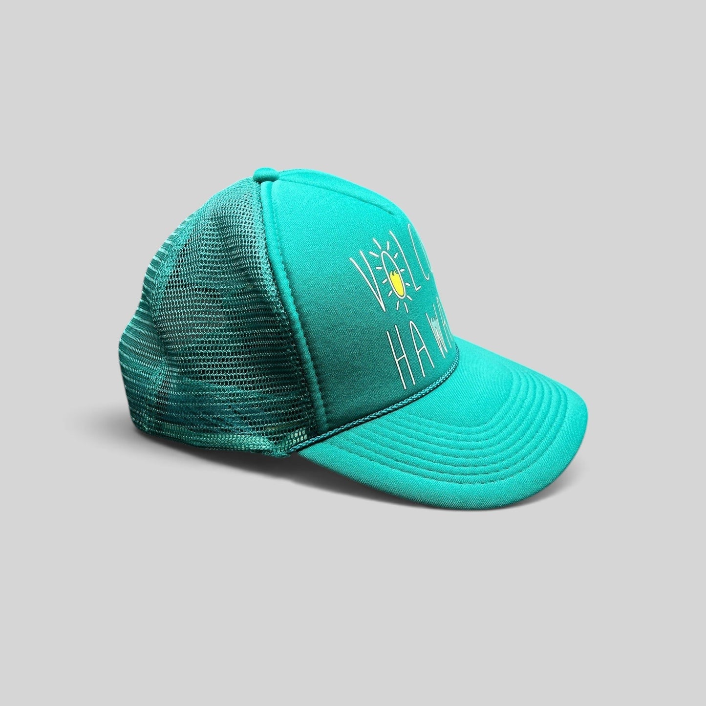 Raree Finds teal Volcom Hawaii trucker hat with foam front, mesh back, rope detail, and sun and wave graphic.