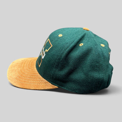 Raree Finds vintage Treasure Island Las Vegas snapback hat with green wool crown and tan suede brim