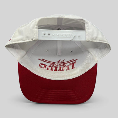 Raree Finds Trump 2024 snapback hat interior view showing white crown, red bill, and adjustable plastic closure