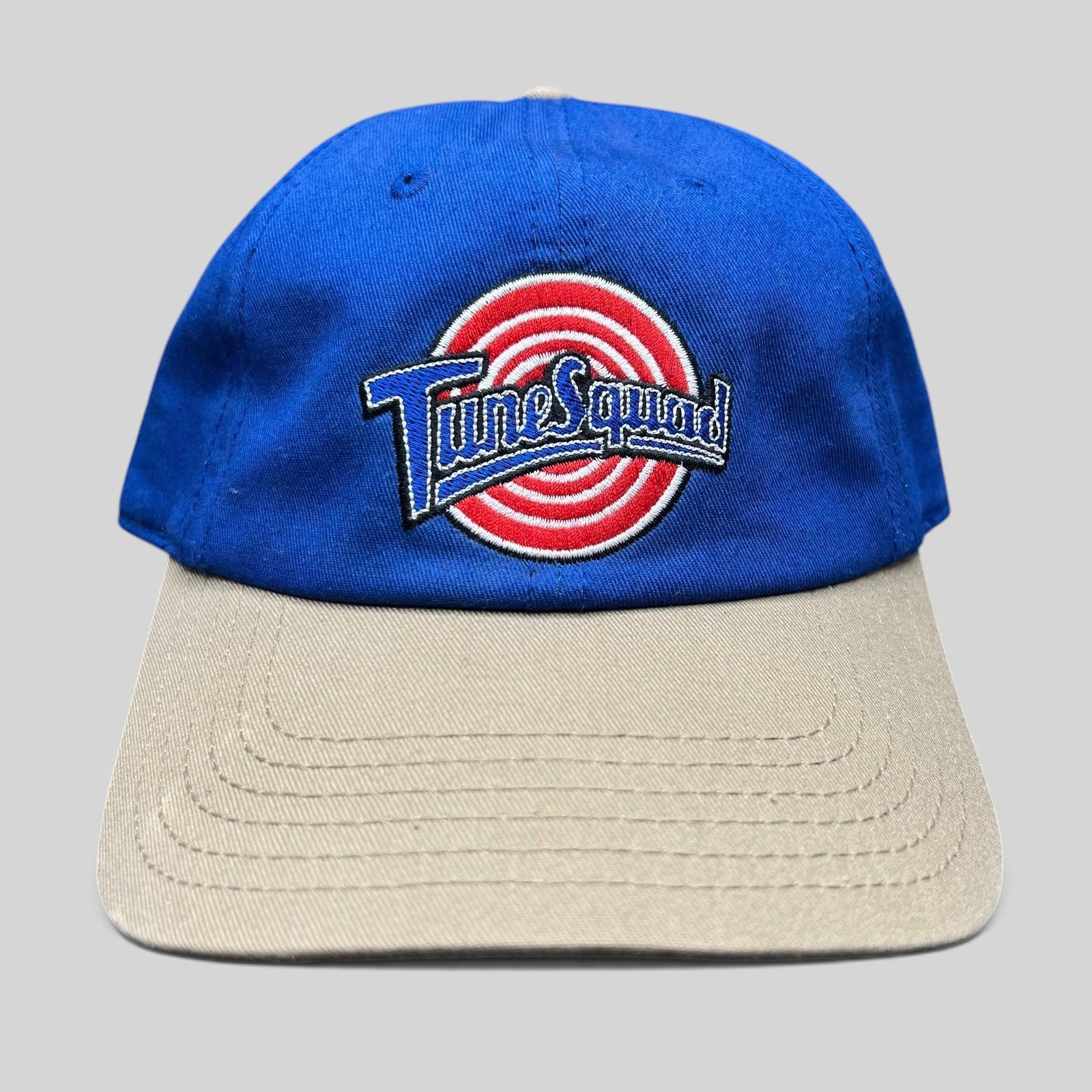 Raree Finds 2017 Space Jam Tune Squad strapback hat with royal blue cotton crown and khaki brim, front view.