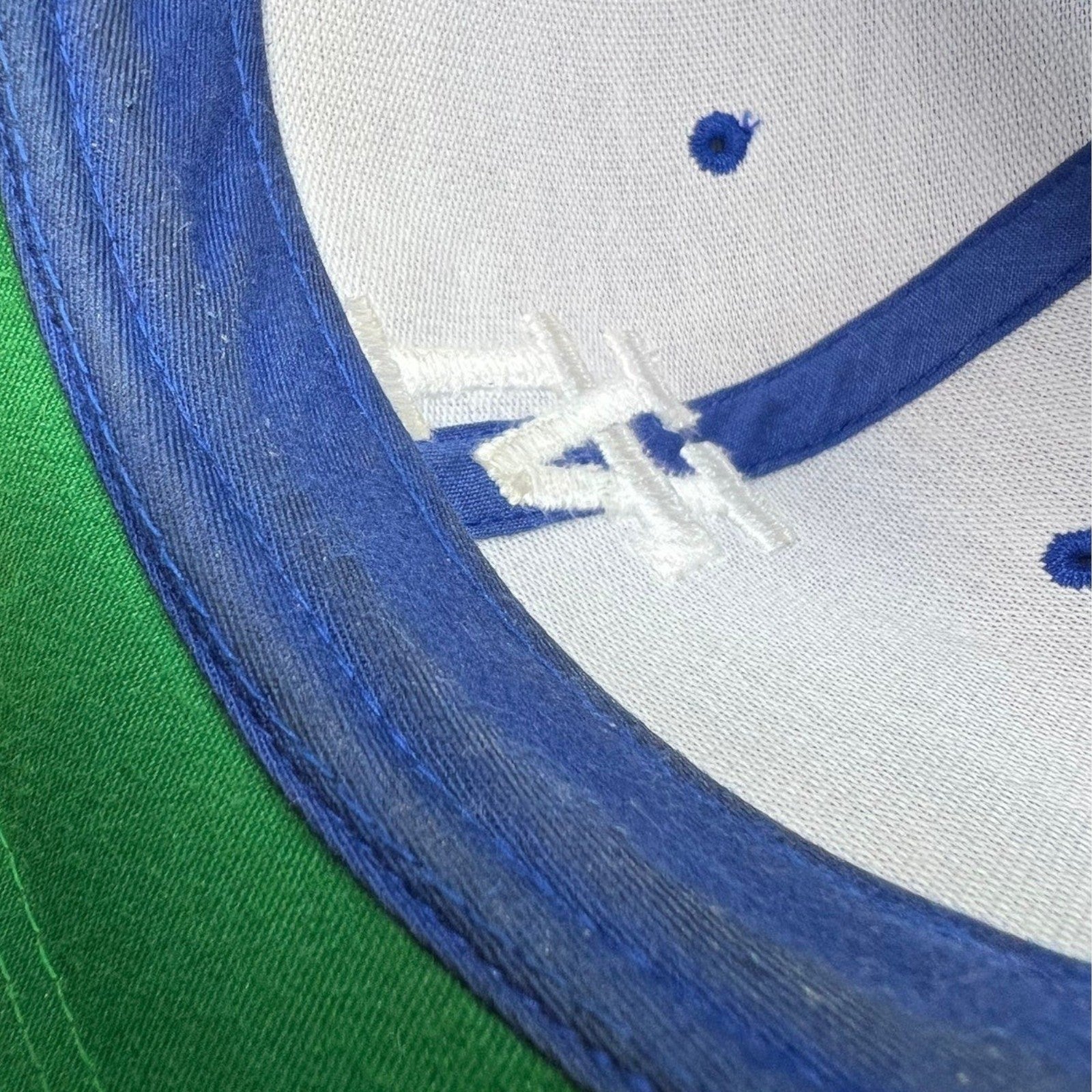Raree Finds Uniform Studios Los Angeles snapback interior showing white logo embroidery and classic green undervisor