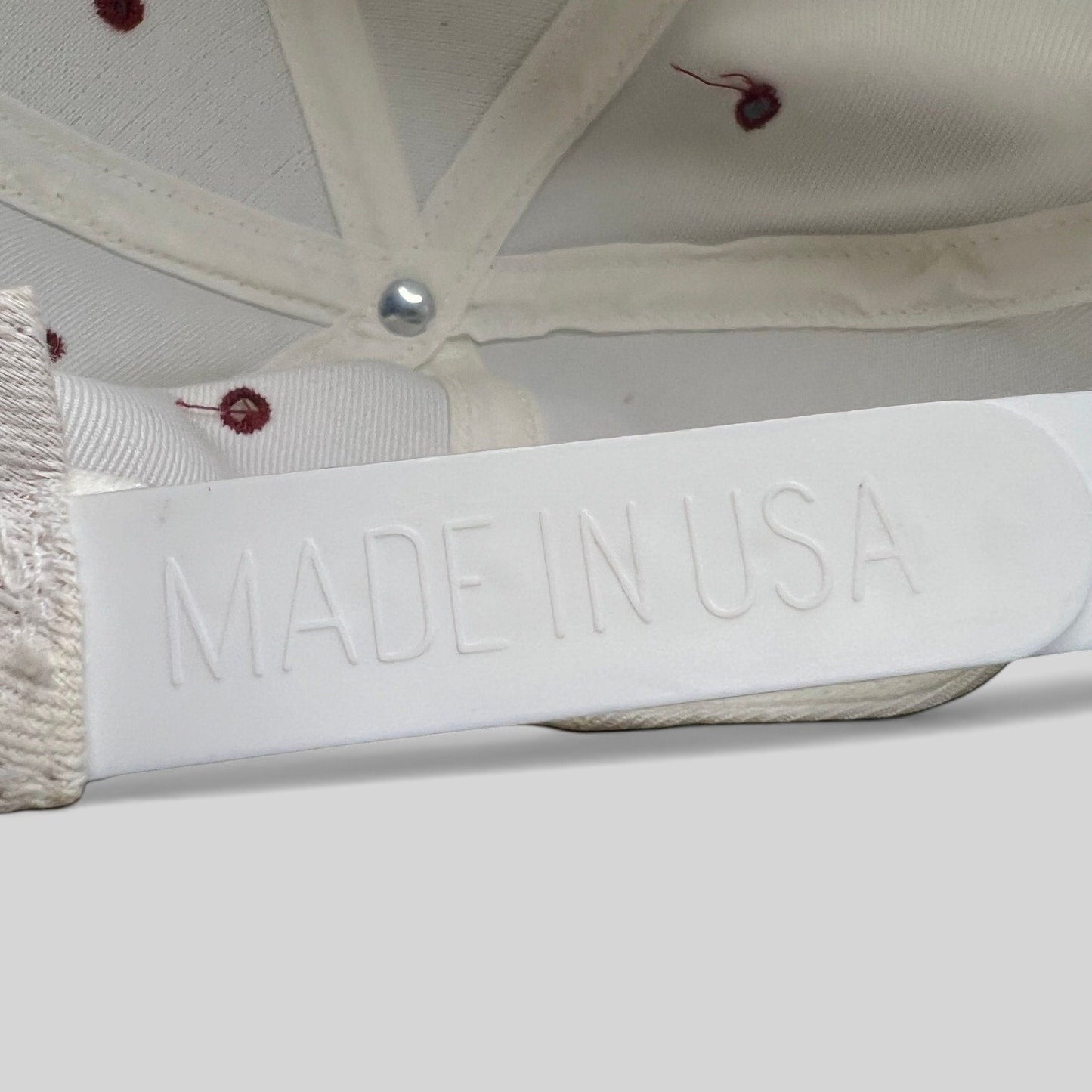 Raree Finds vintage 1995 USC Cotton Bowl snapback hat showing the white plastic Made in USA adjustable strap detail