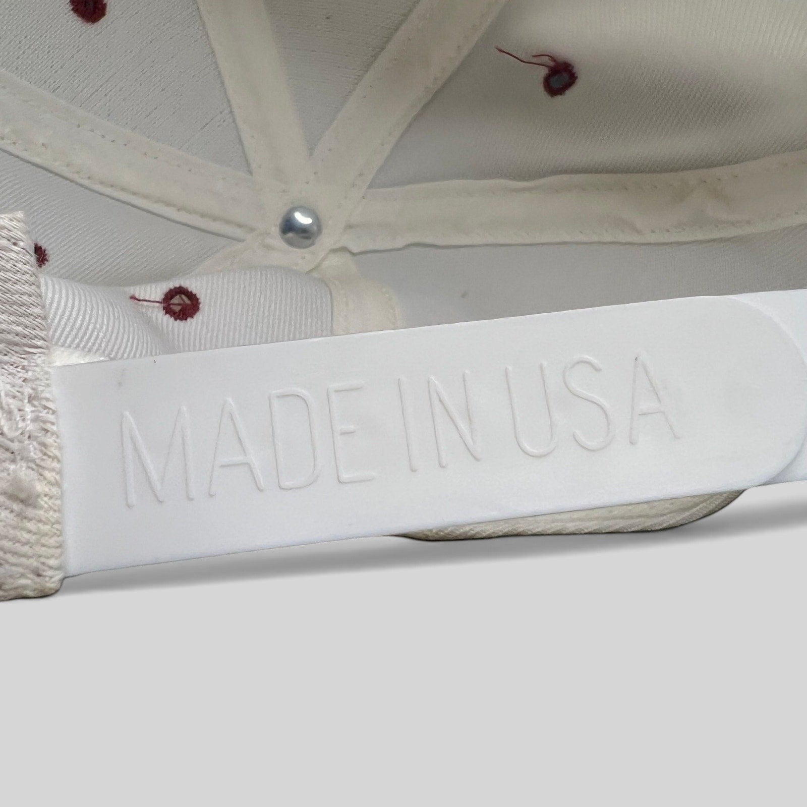 Raree Finds vintage 1995 USC Cotton Bowl snapback hat showing the white plastic Made in USA adjustable strap detail