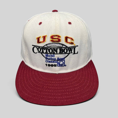 Raree Finds vintage 1995 USC Cotton Bowl snapback hat with white crown, cardinal red brim, and embroidered logo.