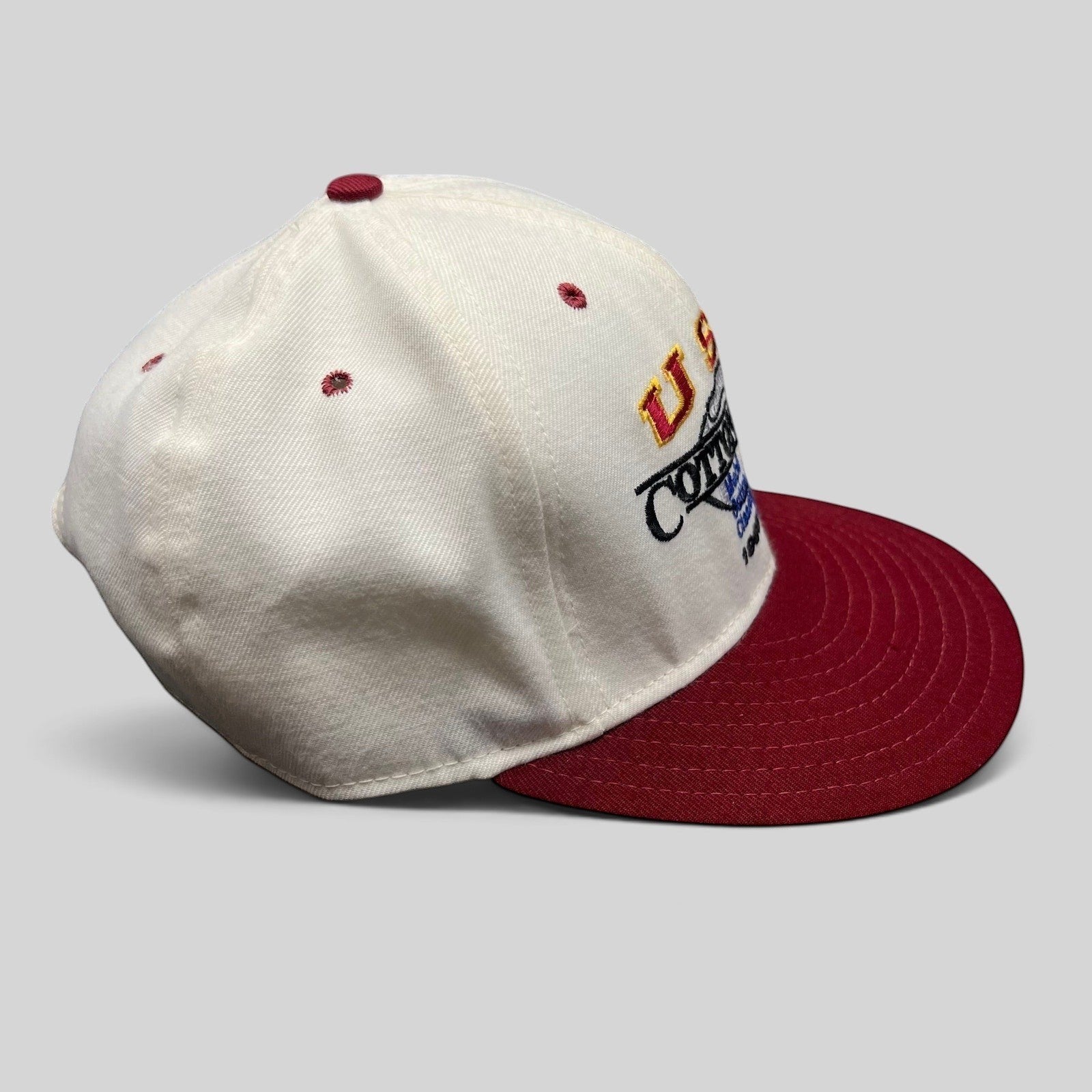 Raree Finds vintage 1995 USC Cotton Bowl snapback hat with a white cotton crown and cardinal red brim.