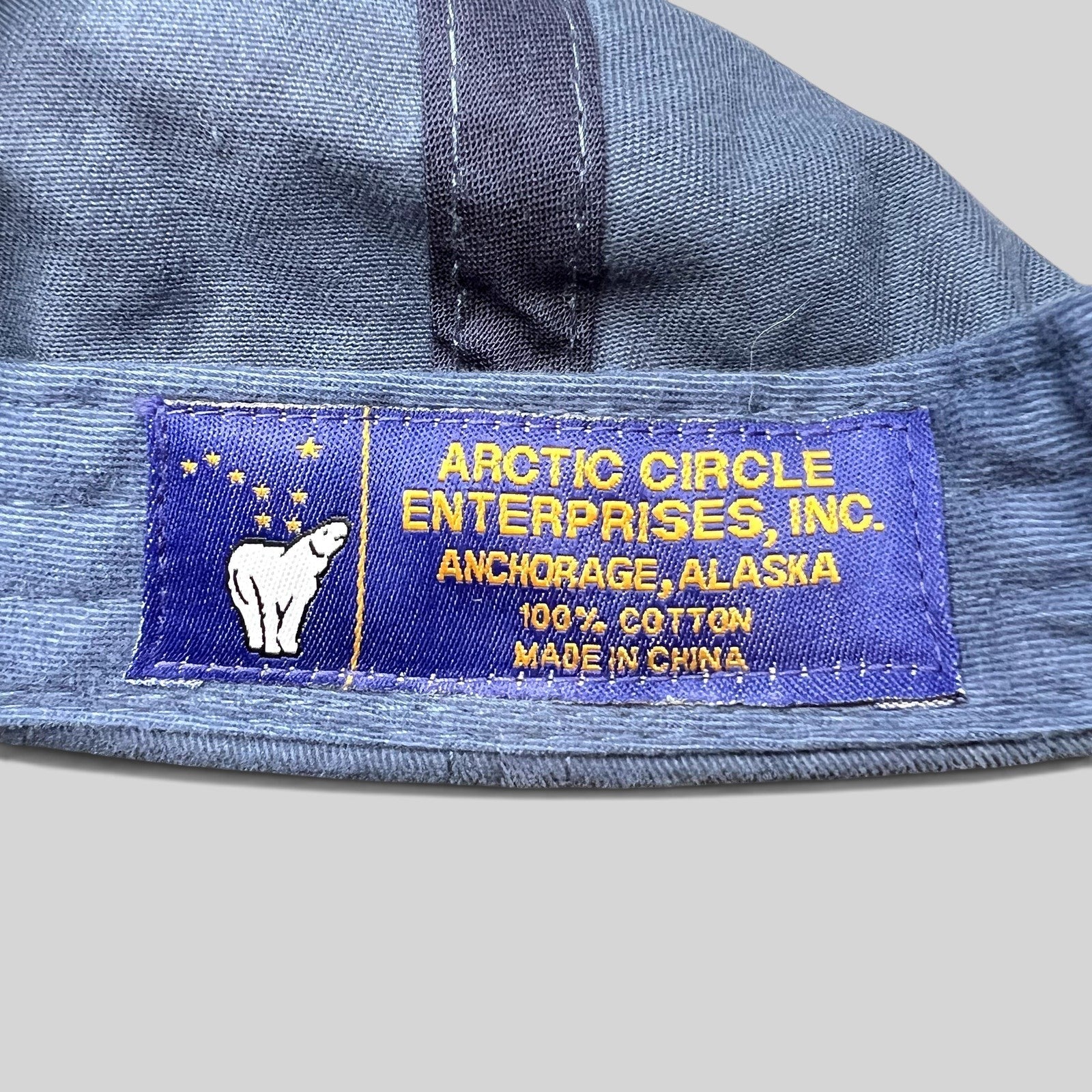Raree Finds vintage Arctic Circle Enterprises hat interior label featuring a polar bear logo and cotton fabric info