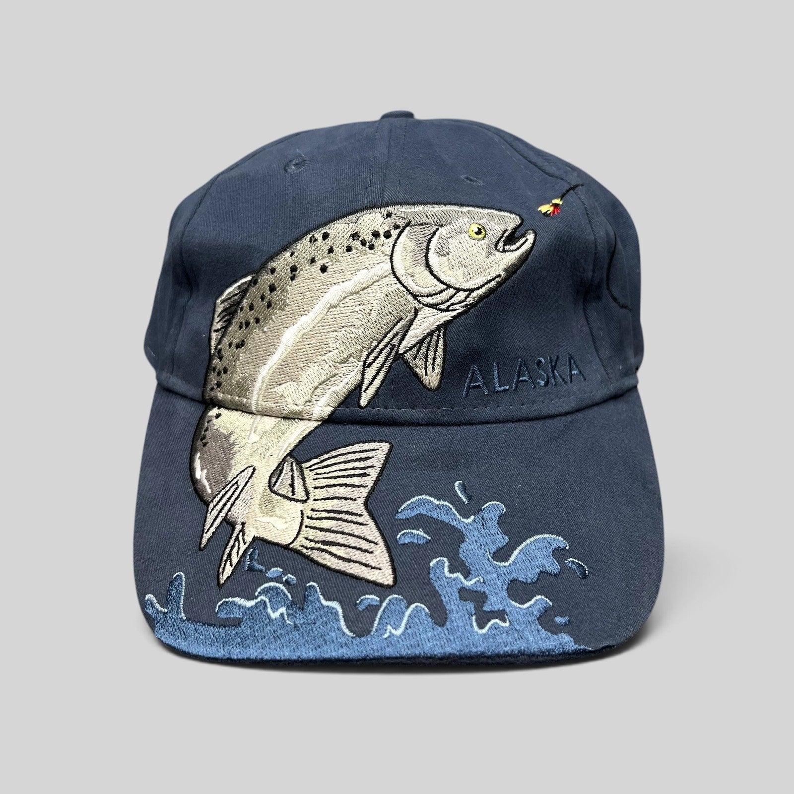 Raree Finds vintage navy cotton strapback hat featuring an embroidered rainbow trout and Alaska text