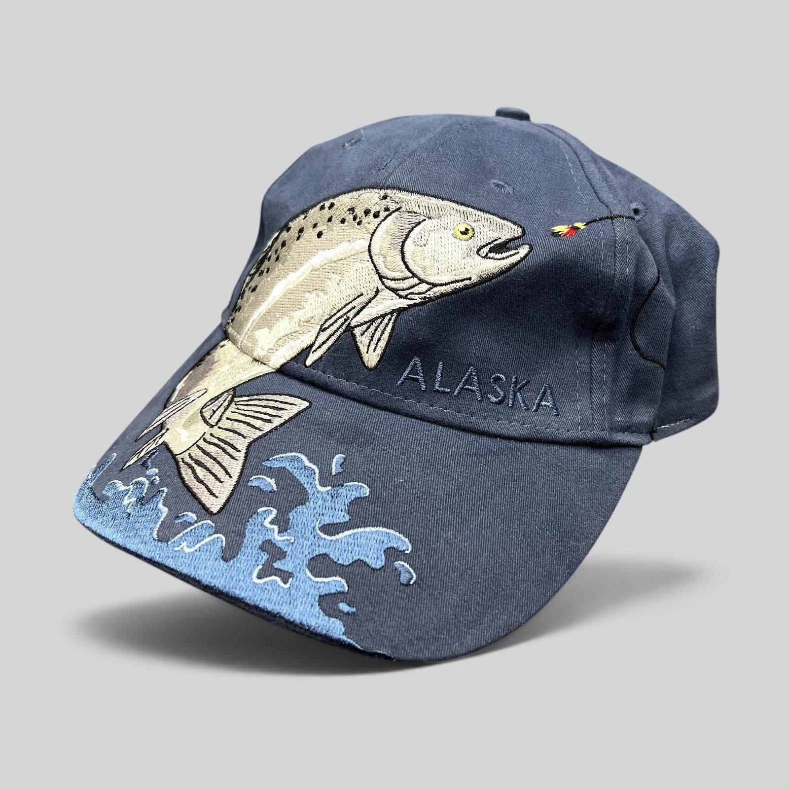 Raree Finds vintage blue cotton strapback hat featuring oversized embroidered rainbow trout and Alaska text