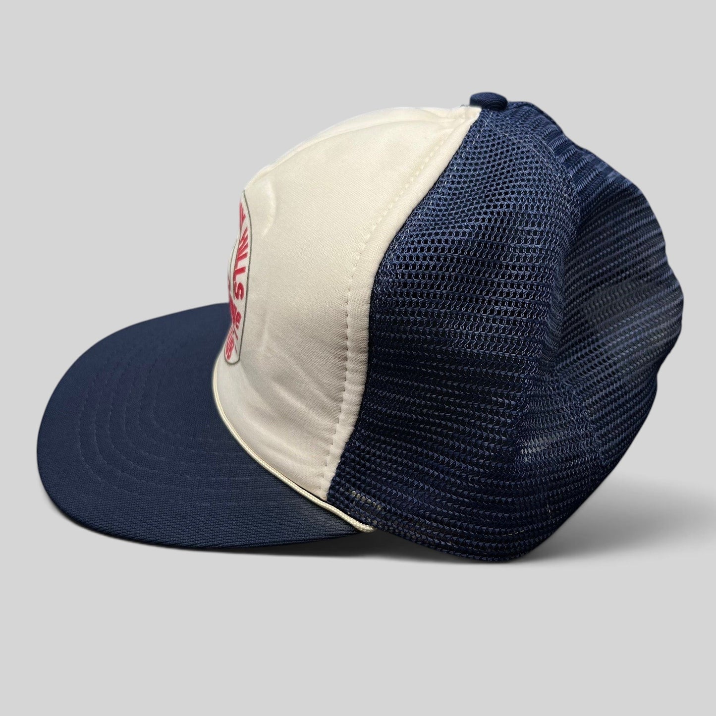 Raree Finds vintage Beverly Hills Gun Club trucker hat with white foam front, navy mesh back, and snapback closure.
