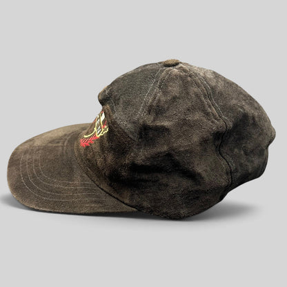 Raree Finds vintage black suede strapback hat with embroidered Aspen crest logo, side profile view.