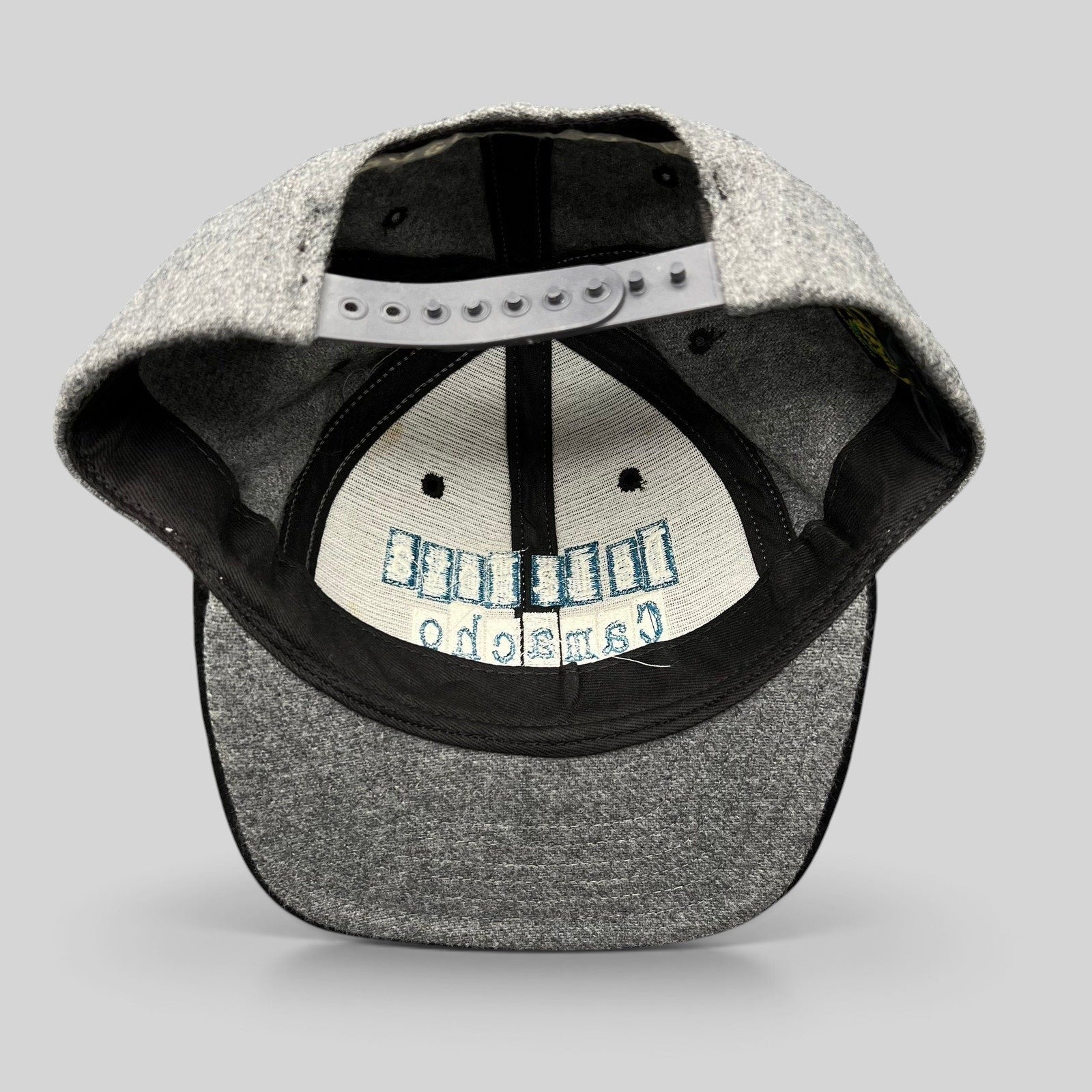 Raree Finds vintage 1997 De La Hoya vs Camacho boxing snapback hat showing the interior grey wool-blend crown and strap