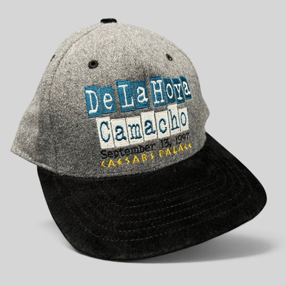 Raree Finds vintage 1997 De La Hoya vs Camacho boxing snapback hat with grey wool crown and black brim.