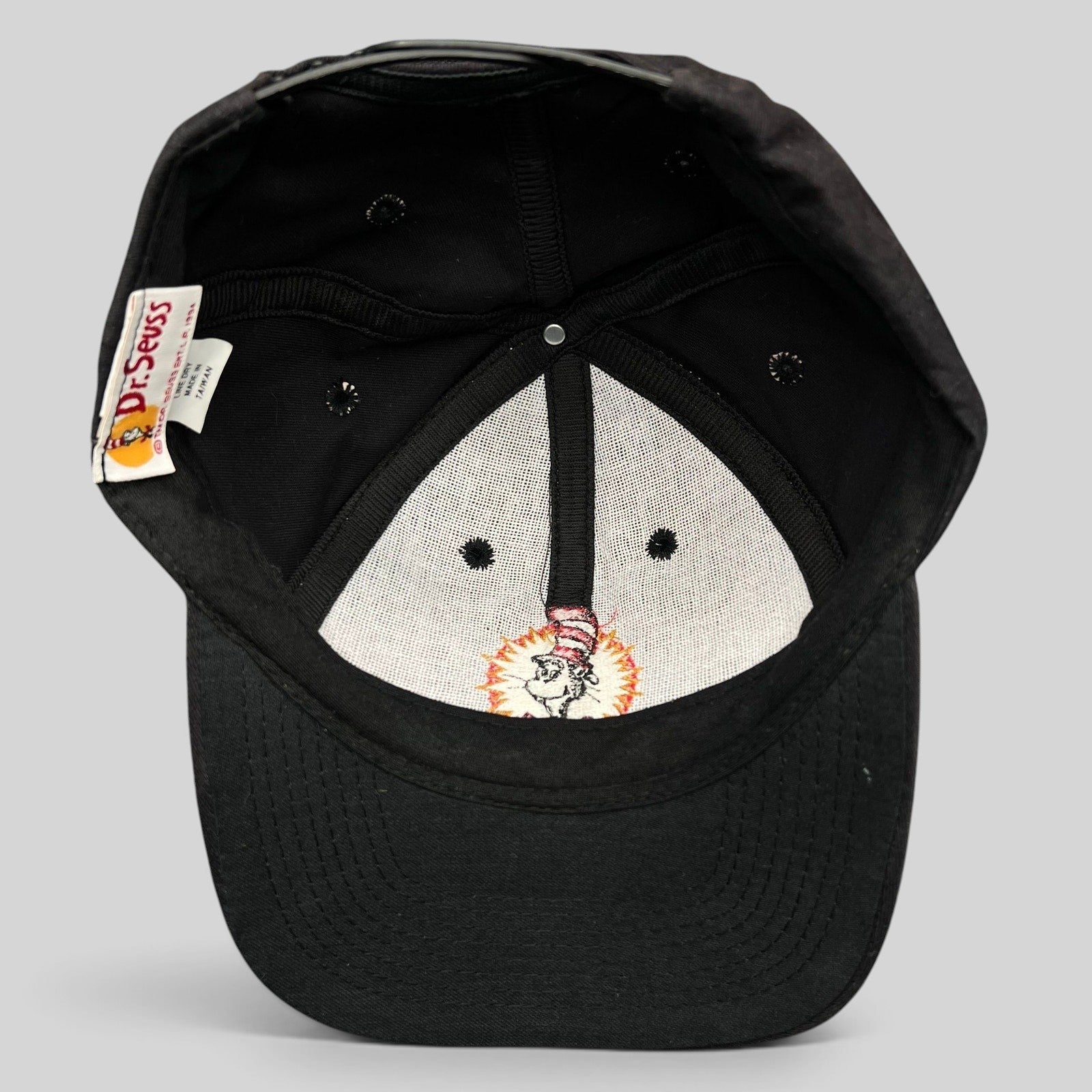 Raree Finds vintage 1994 Dr. Seuss Cat in the Hat black cotton snapback hat interior view showing tag and embroidery