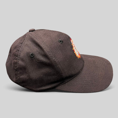 Raree Finds vintage 1994 black cotton snapback hat featuring an embroidered Cat in the Hat graphic on the crown