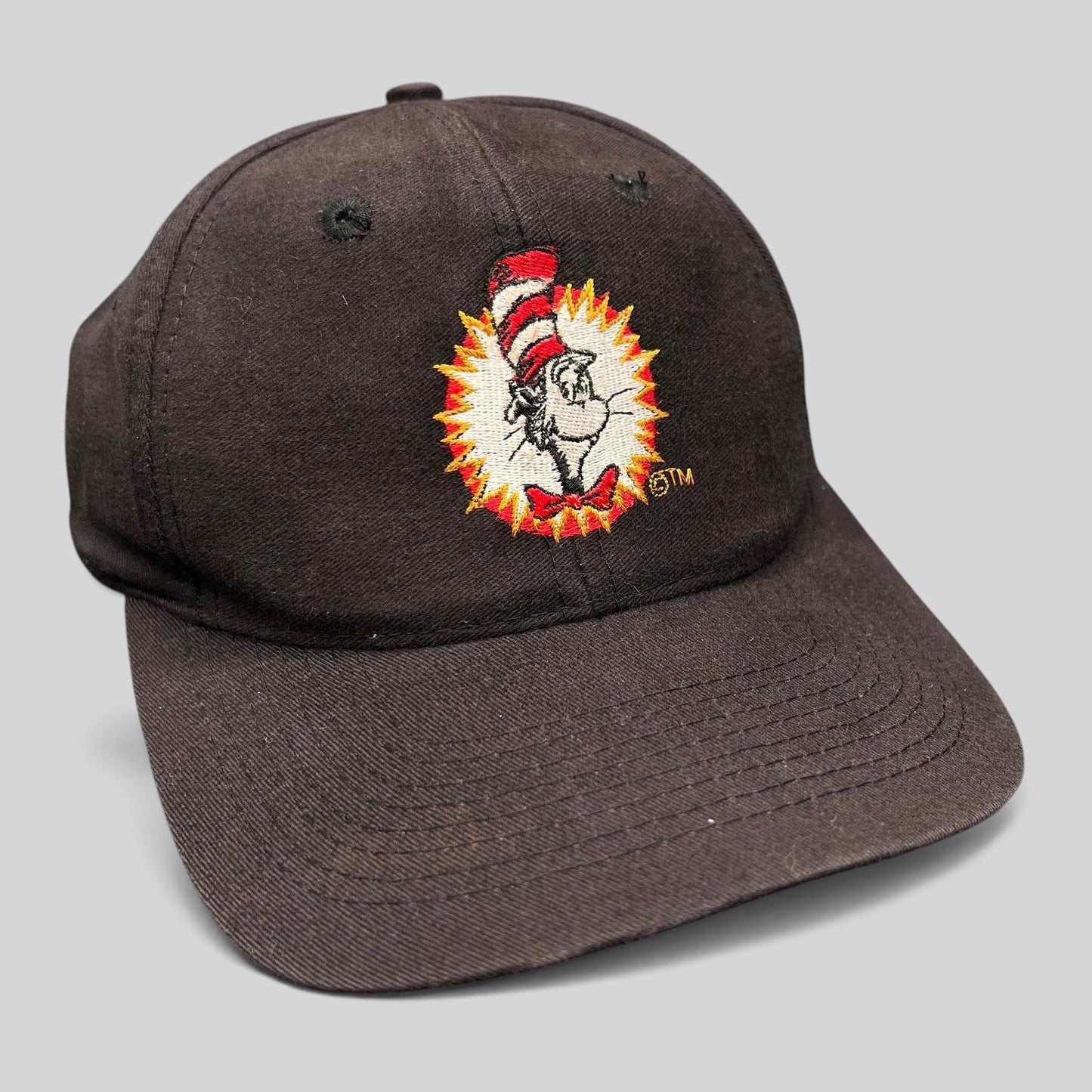 Raree Finds vintage 1994 black cotton snapback hat featuring an embroidered Cat in the Hat graphic