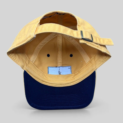 Raree Finds vintage Walt Disney World yellow cotton strapback hat with metal buckle closure, interior view