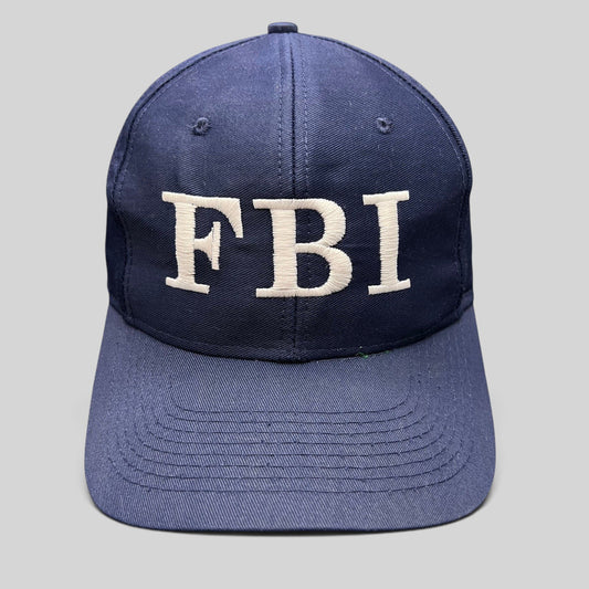 Raree Finds vintage navy blue snapback hat with white embroidered FBI lettering and a classic structured crown.