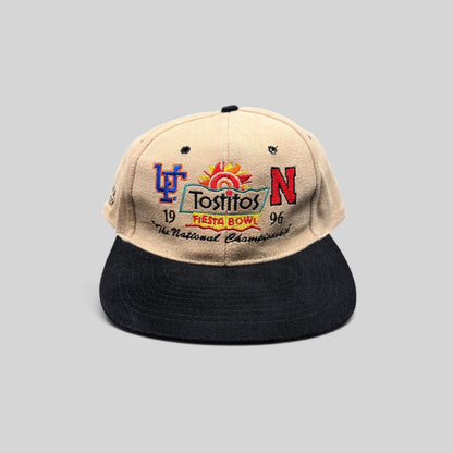 Raree Finds vintage 1996 Tostitos Fiesta Bowl snapback hat with tan crown, black brim, and multicolor team embroidery.