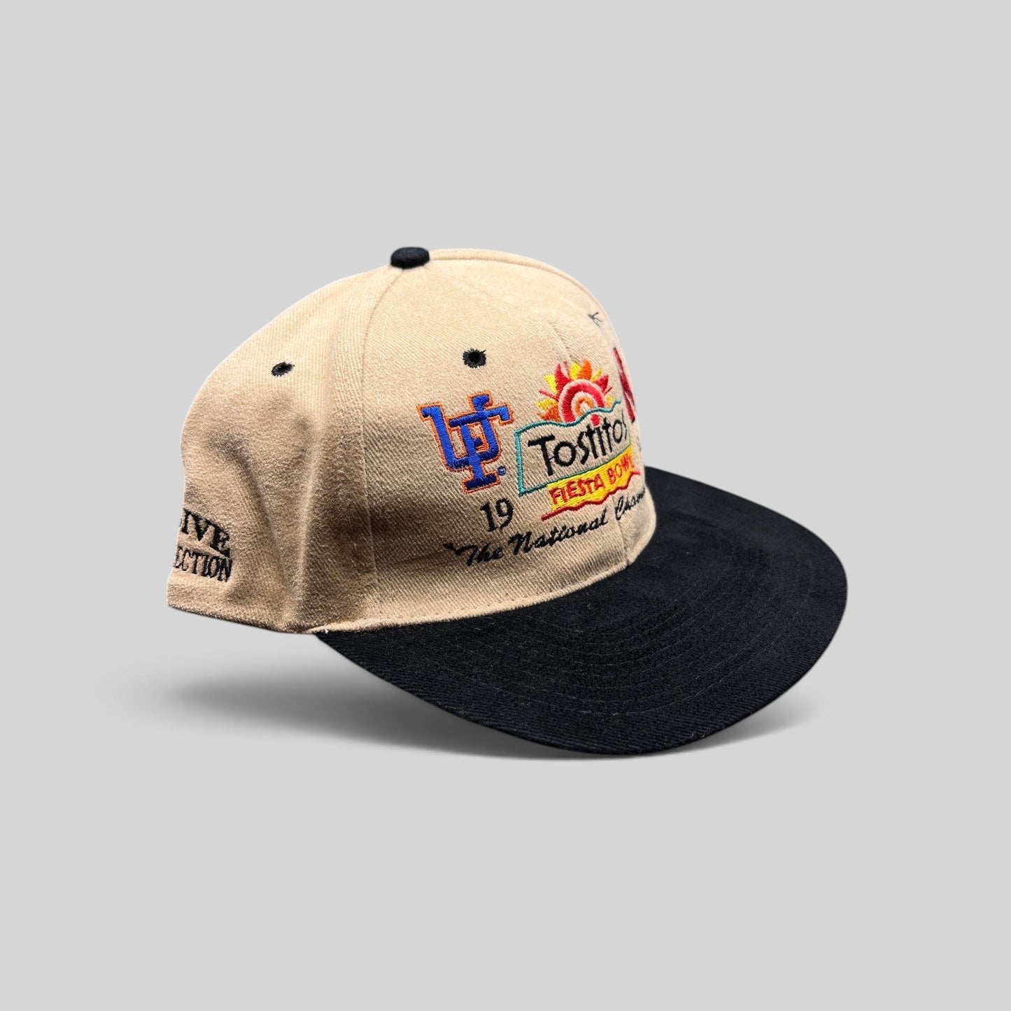 Raree Finds vintage 1996 Tostitos Fiesta Bowl snapback hat with tan crown, black brim, and multicolor embroidery.