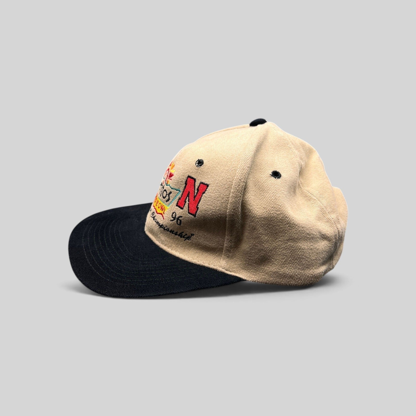 Raree Finds vintage 1996 Tostitos Fiesta Bowl snapback hat with tan cotton crown, black brim, and team embroidery.