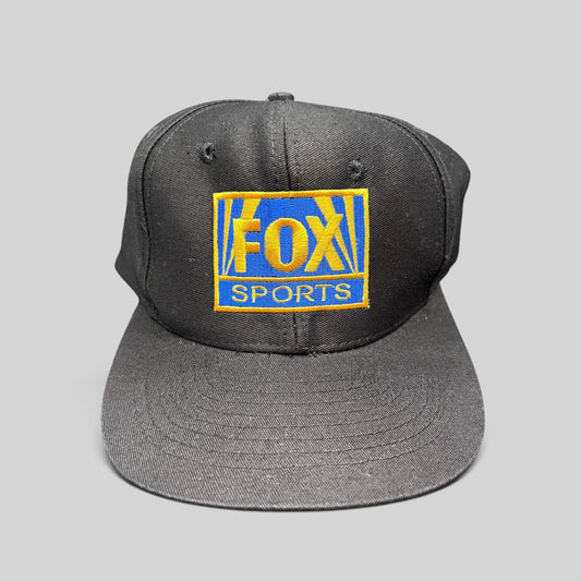 Raree Finds vintage 90s FOX Sports black cotton snapback hat with gold and royal blue embroidered logo