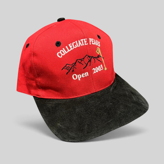 Raree Finds vintage 2003 Collegiate Peaks Open golf hat with red crown, black suede brim, and mountain embroidery.