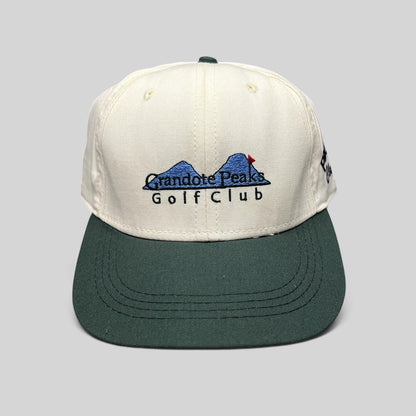 Raree Finds vintage 1997 Imperial Headwear two-tone white and green golf hat with Grandote Peaks Golf Club embroidery
