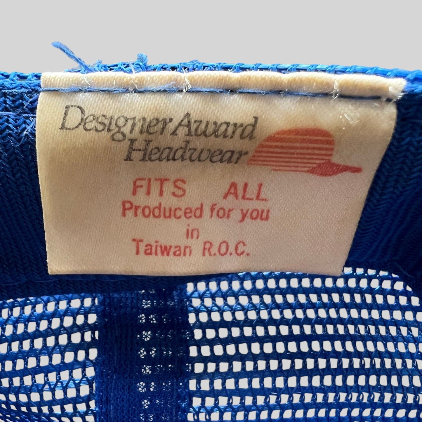 Raree Finds vintage Designer Award Headwear tag from a Kansas City Royals trucker hat made in Taiwan