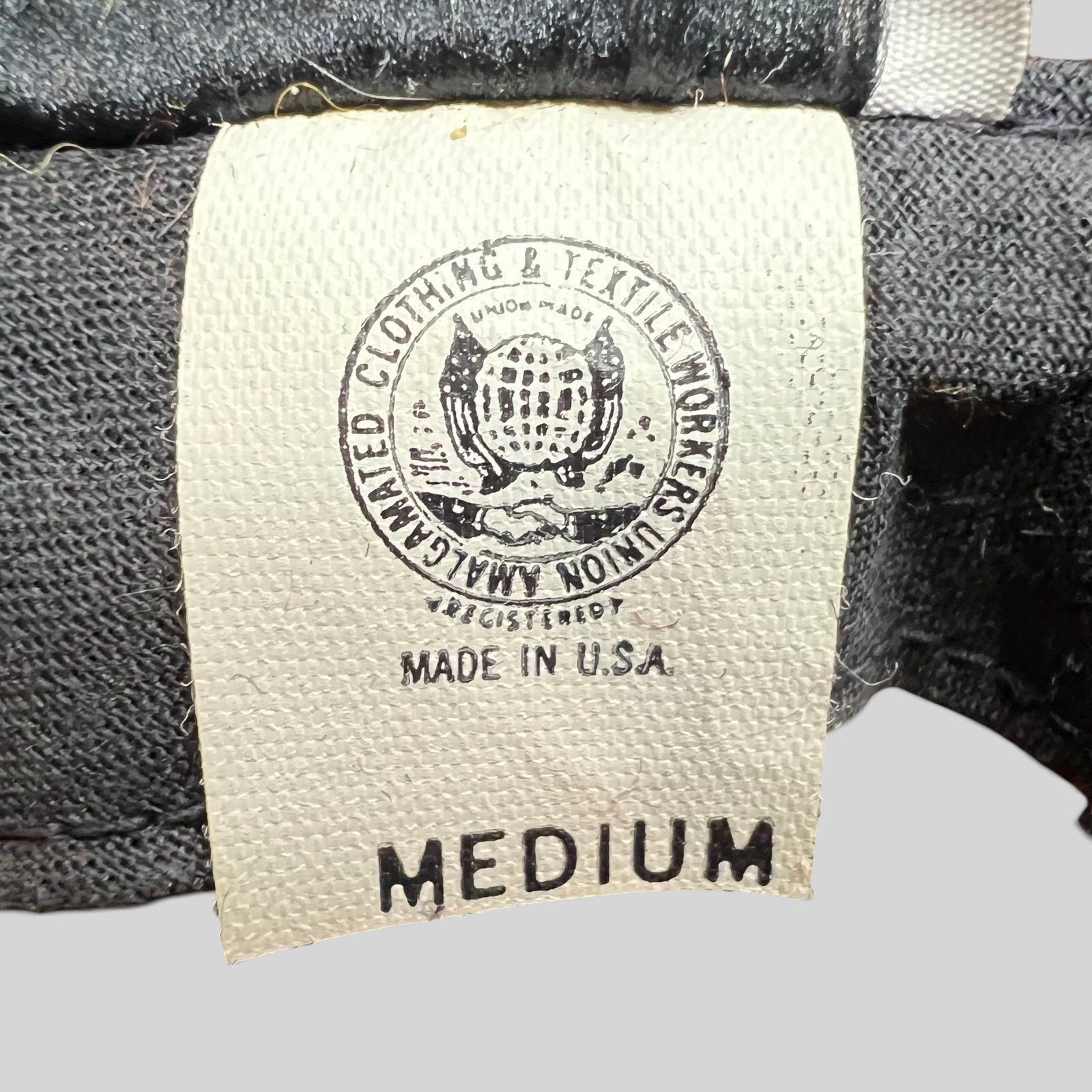 Raree Finds vintage New York Hat Co cap interior tag showing Amalgamated Clothing and Textile Workers Union label