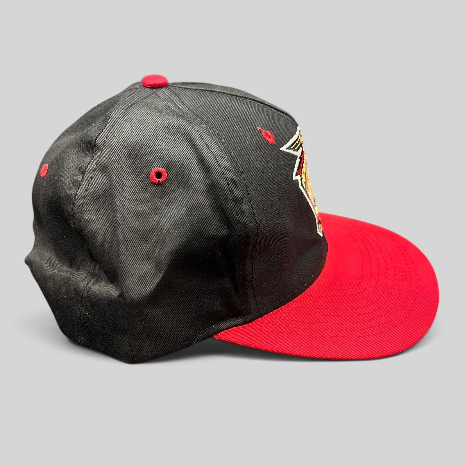 Raree Finds vintage 1997 Indianapolis 500 Logo 7 snapback hat with black crown, red brim, and embroidered logo.