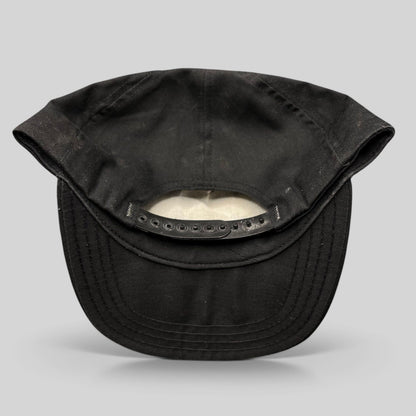 Raree Finds vintage Jack Daniel’s snapback hat showing the black plastic adjustable strap and interior construction