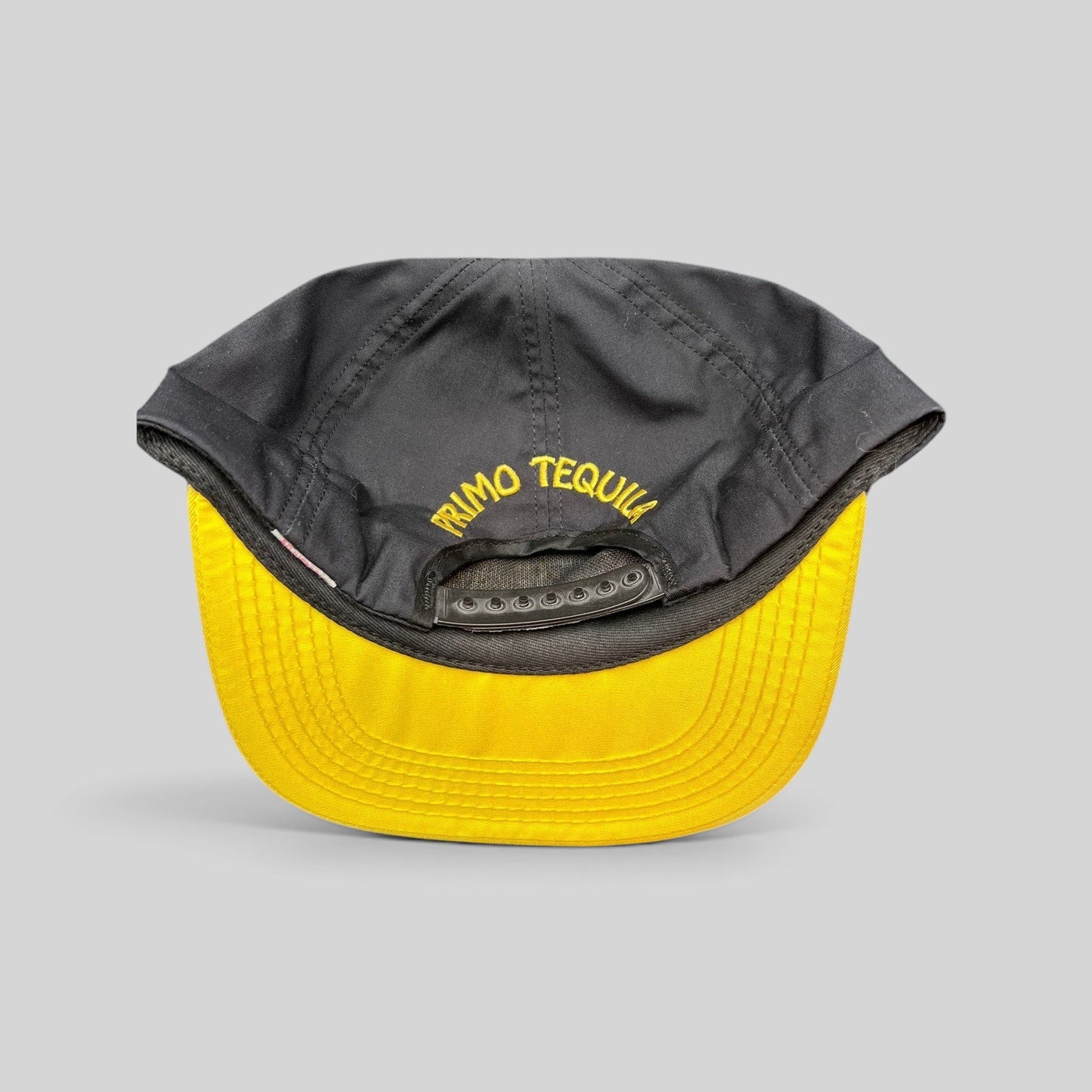 Raree Finds vintage black and gold Jose Cuervo snapback hat with Primo Tequila embroidery on the back