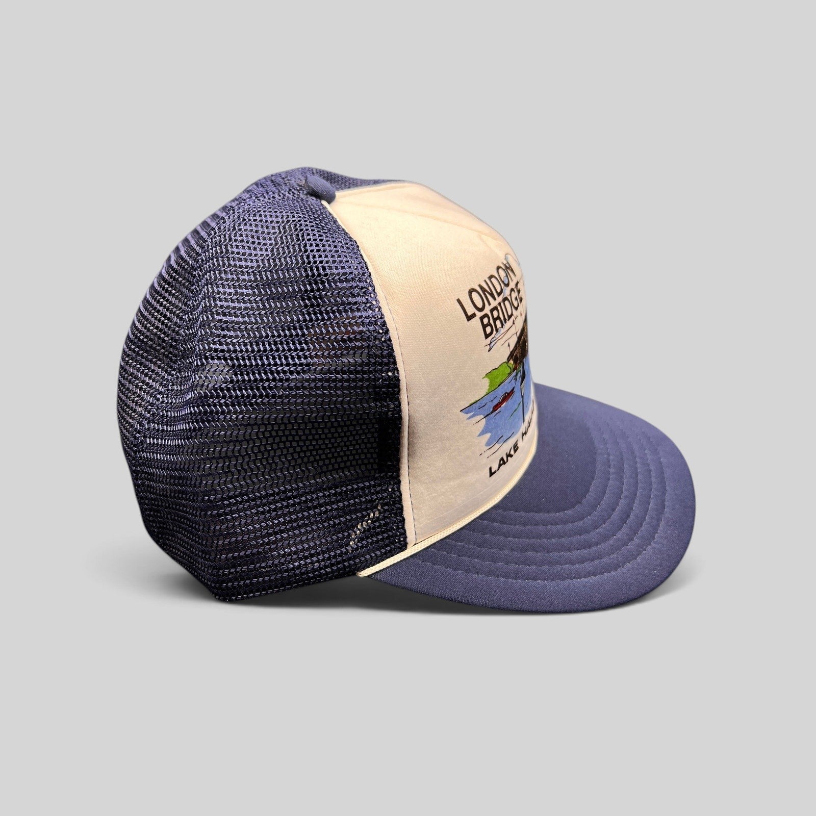 Raree Finds vintage 80s navy and white foam trucker hat featuring a London Bridge Lake Havasu City graphic print