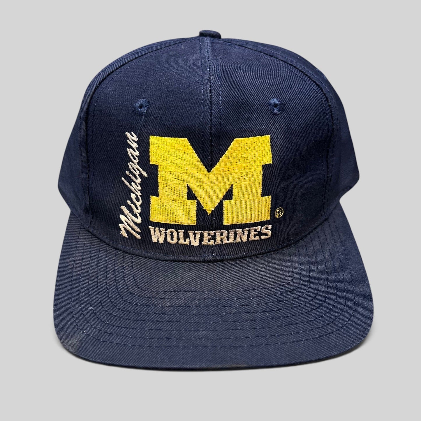 Raree Finds vintage navy Michigan Wolverines snapback hat with maize block M embroidery and collegiate lettering