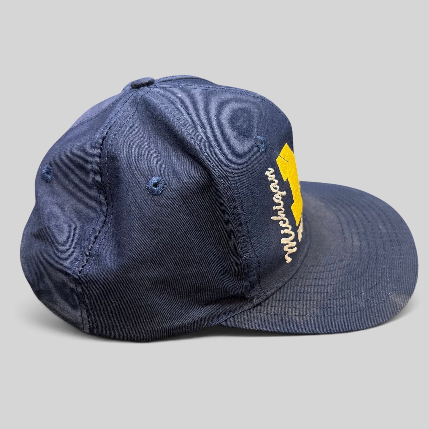 Raree Finds vintage navy Michigan Wolverines snapback hat with maize embroidered block M logo and collegiate lettering