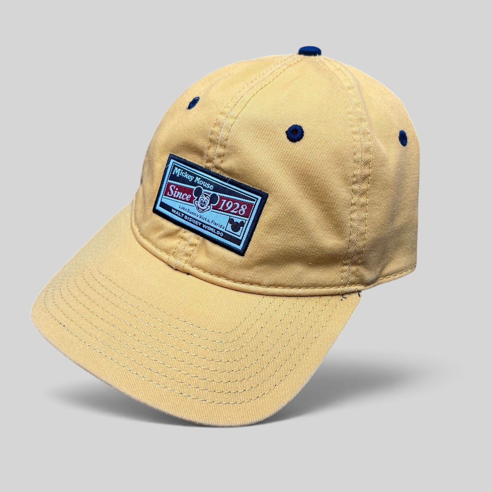 Raree Finds vintage yellow cotton Walt Disney World strapback hat with a Mickey Mouse Since 1928 patch