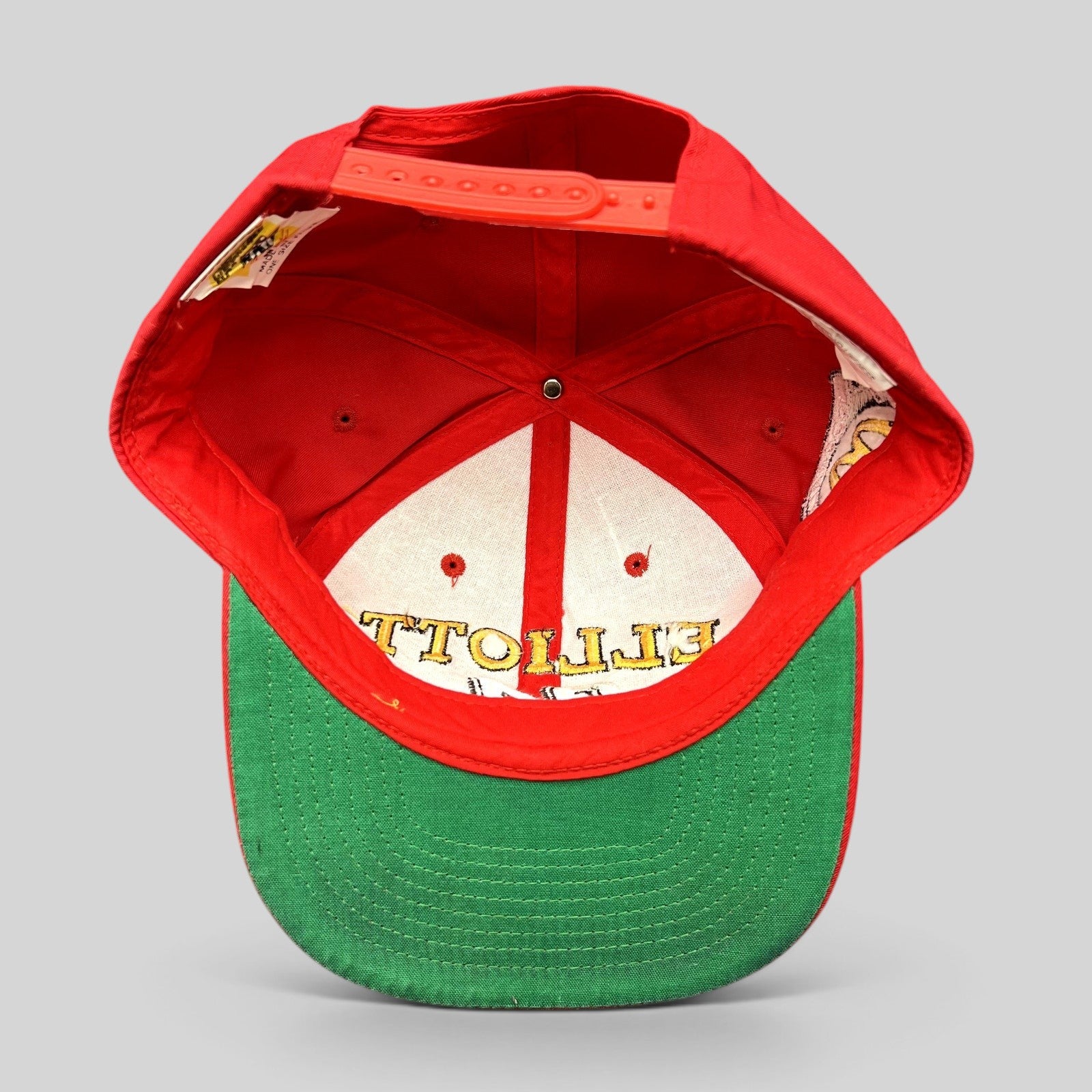 Raree Finds vintage 1995 Bill Elliott NASCAR snapback hat interior showing green undervisor and red structured crown