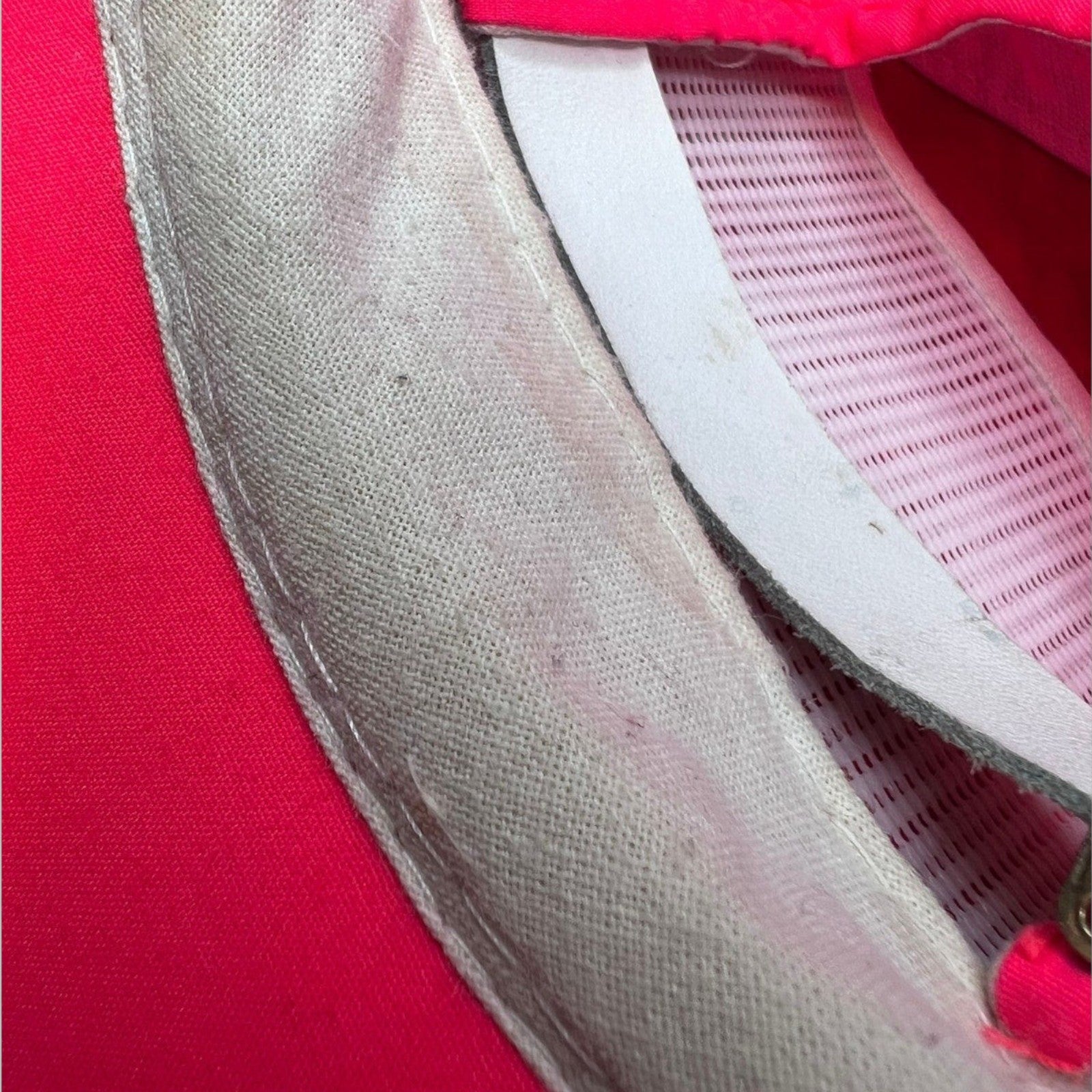 Interior view of Raree Finds vintage 80s neon pink nylon ski hat showing the foam sweatband and inner lining