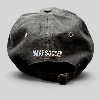 Raree Finds vintage black Nike Soccer strapback hat with embroidered logo and adjustable metal buckle back closure.