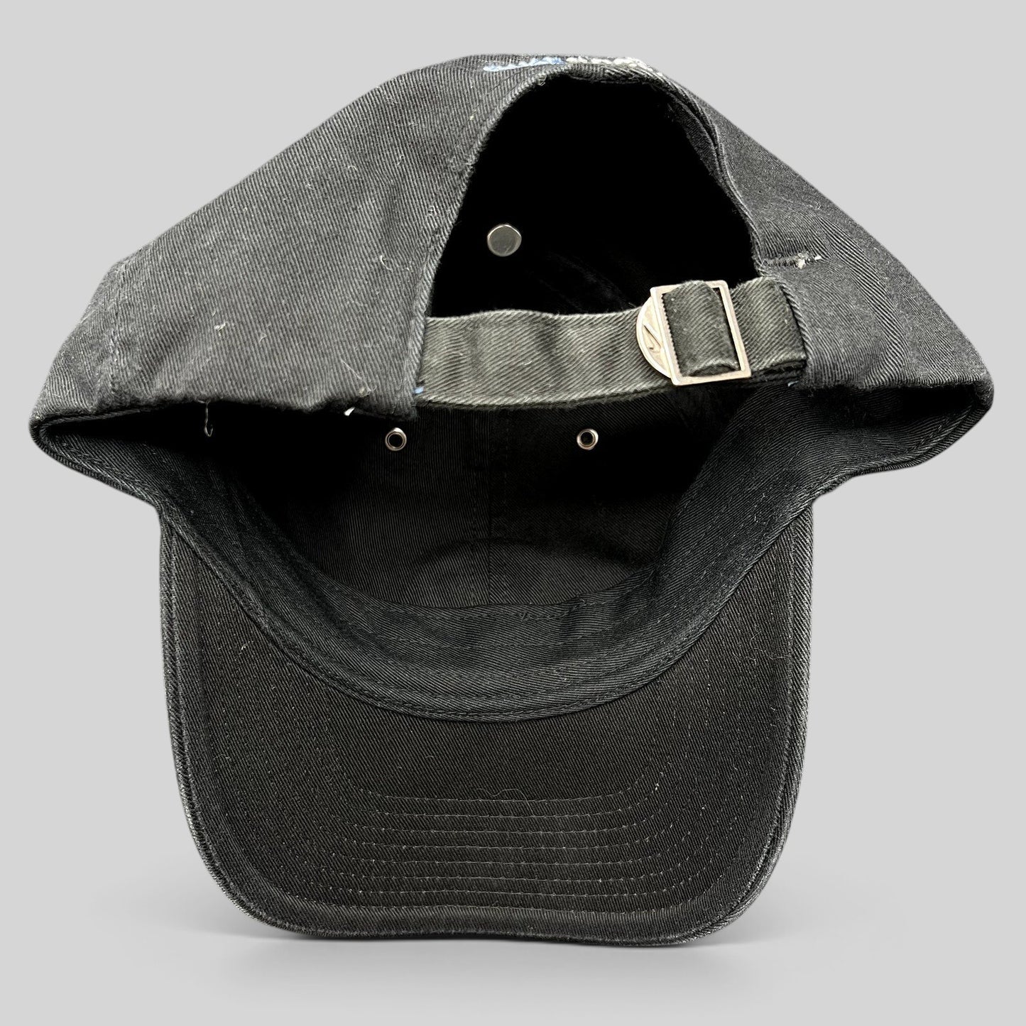 Raree Finds vintage black Nike soccer strapback hat featuring an adjustable metal buckle closure and curved brim.