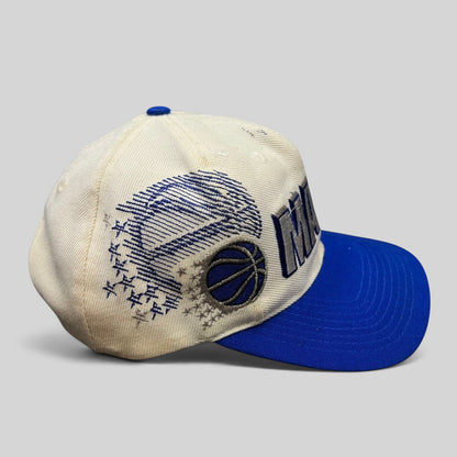Raree Finds vintage Sports Specialties Orlando Magic snapback hat with white crown, royal blue brim, and side logo.