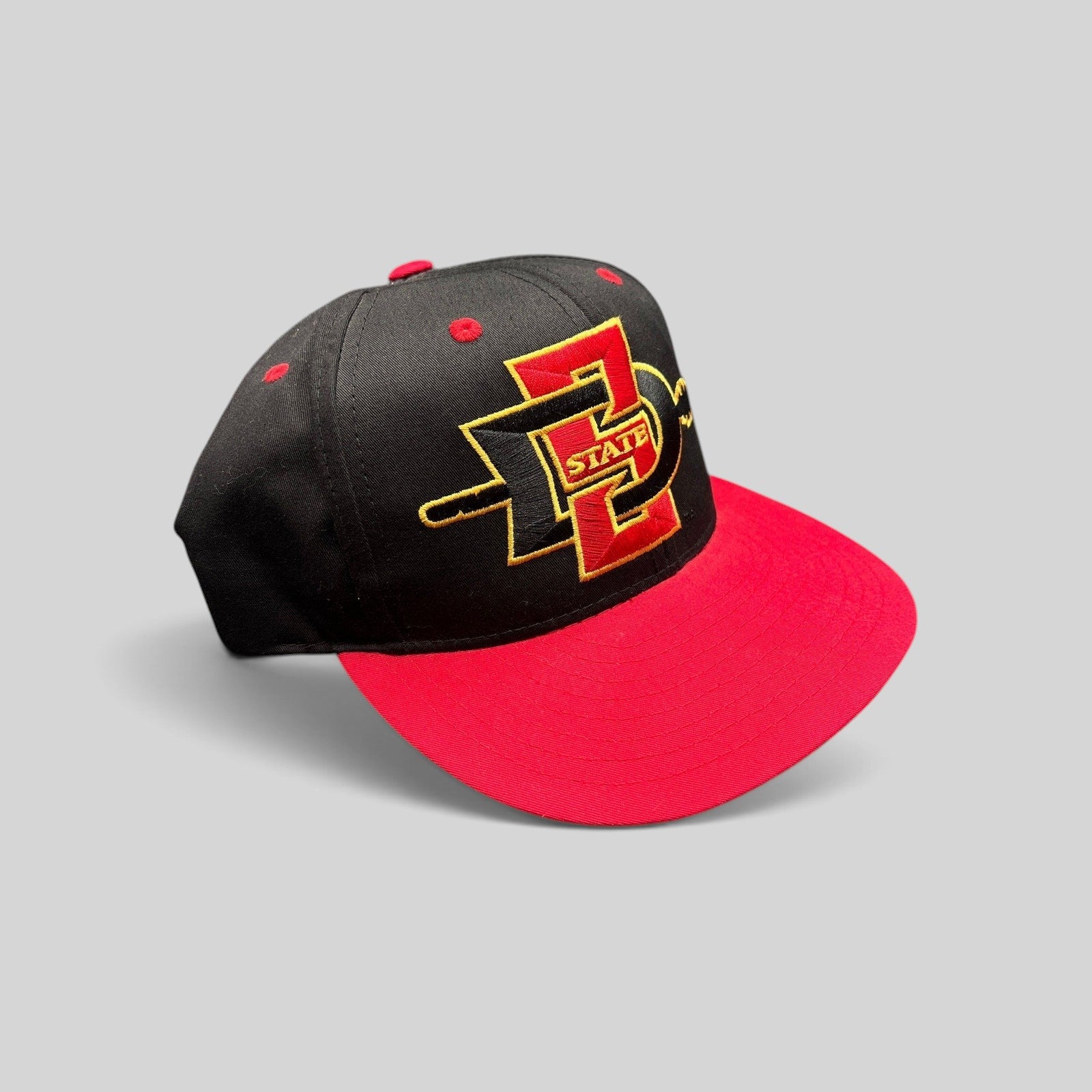 Raree Finds vintage San Diego State Aztecs snapback hat in black and red cotton twill with gold embroidered logo
