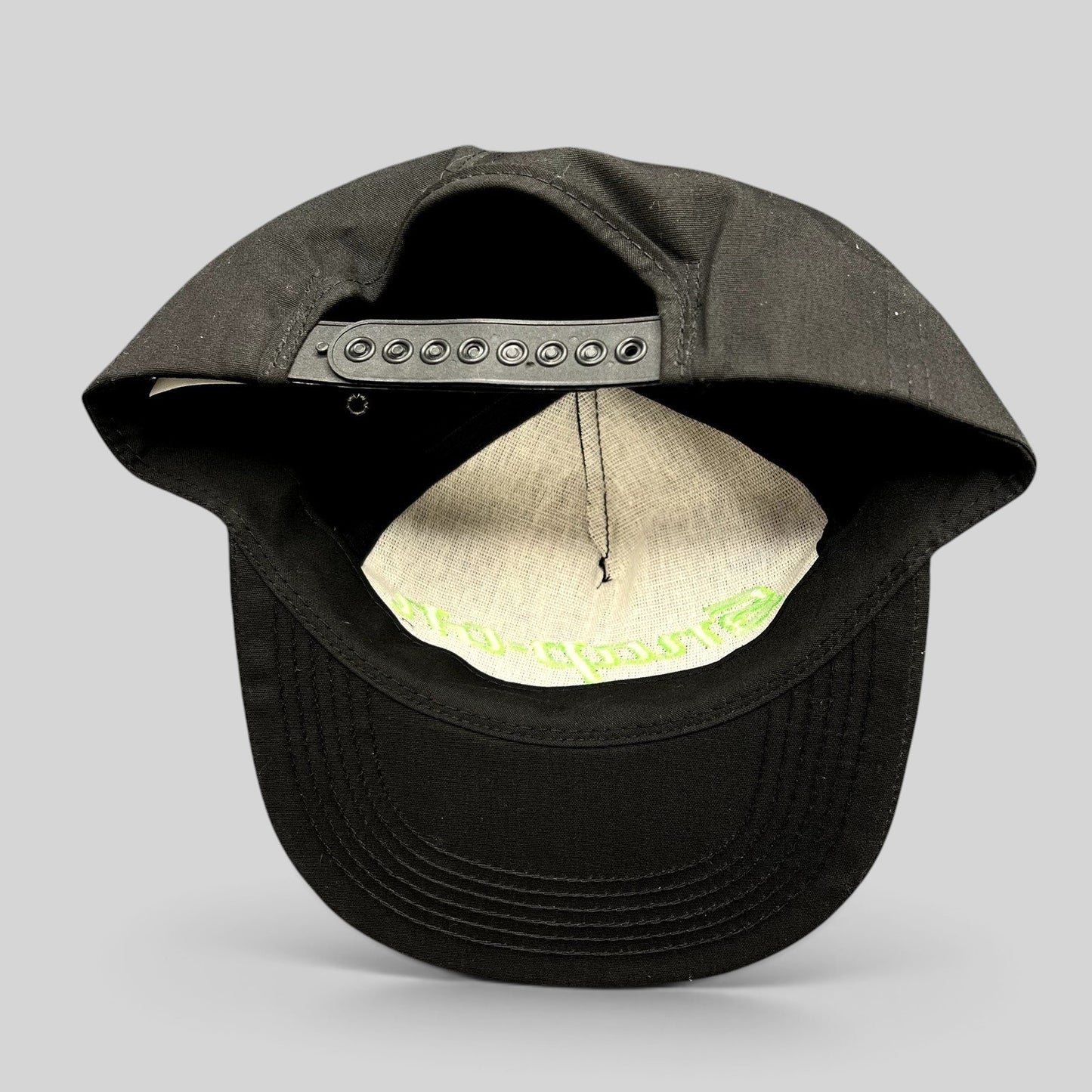 Raree Finds vintage 90s Snap-on Tools black snapback hat showing the adjustable plastic closure and interior detail