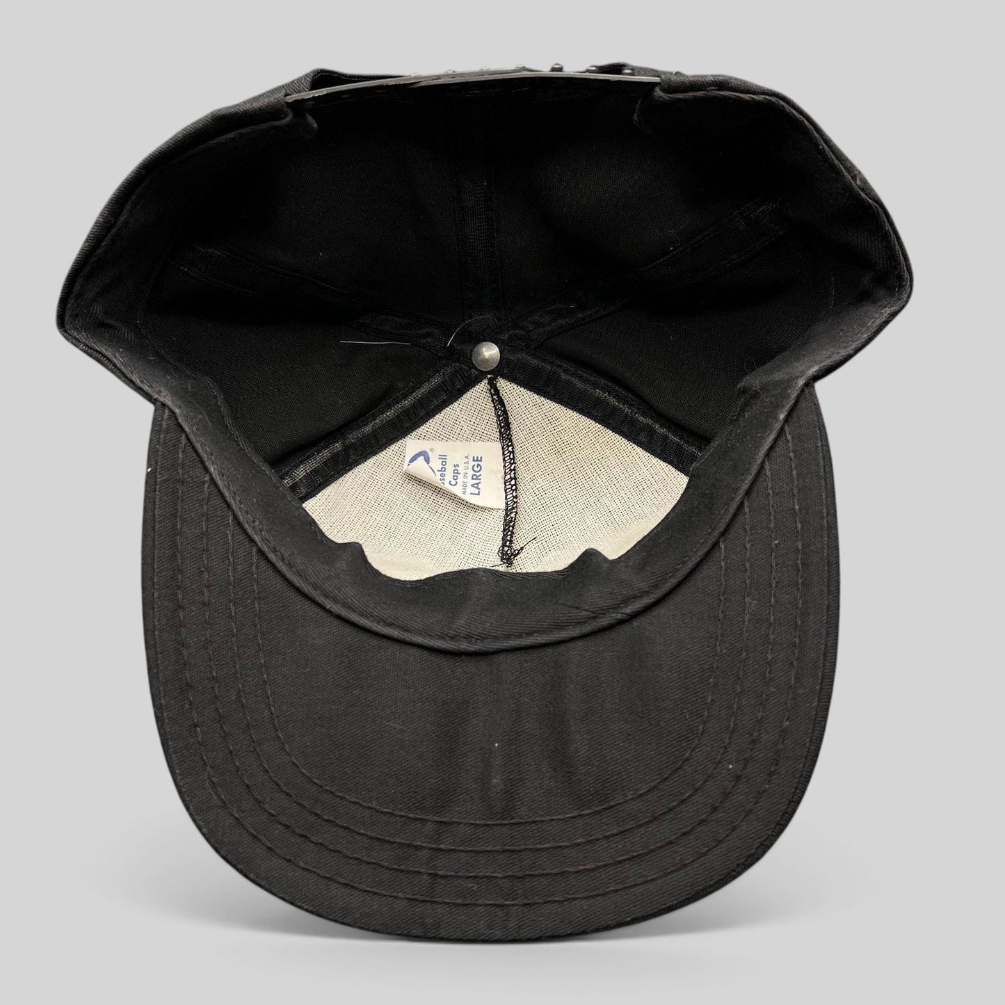 Interior view of a vintage Raree Finds Jack Daniel’s snapback hat showing the AJD Baseball Caps label and construction