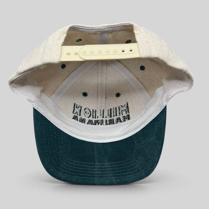 Raree Finds vintage 90s Cameo Million Marijuana March snapback hat showing the interior cream crown and green brim