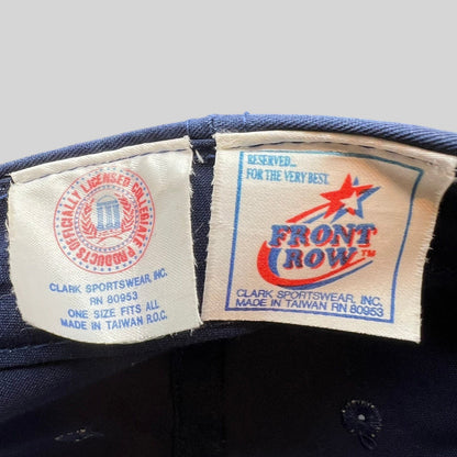 Raree Finds vintage Front Row and Clark Sportswear interior labels inside a navy Michigan Wolverines snapback hat