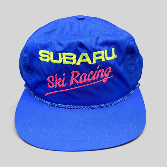 Raree Finds vintage blue nylon Subaru Ski Racing strapback hat with neon embroidery and front rope detail