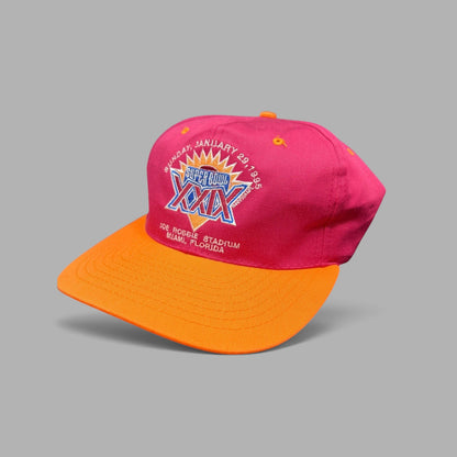 Raree Finds vintage 1995 Super Bowl XXIX snapback hat with maroon crown, orange brim, and embroidered NFL logo details.