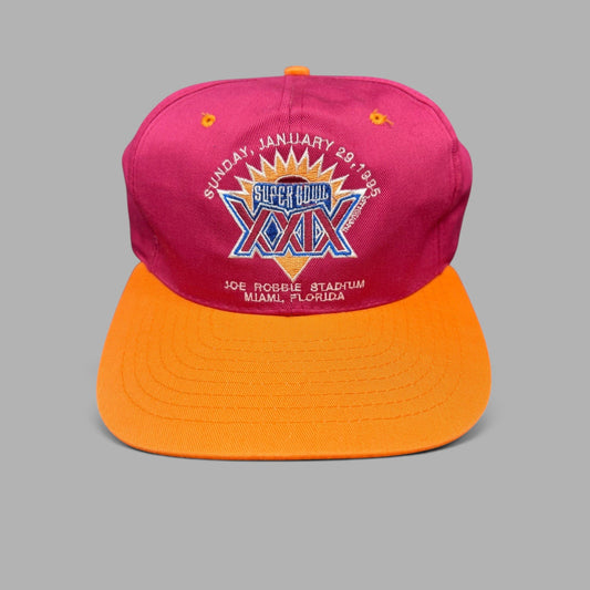 Raree Finds vintage 1995 Super Bowl XXIX New Era snapback hat with maroon crown, orange brim, and embroidered logo.