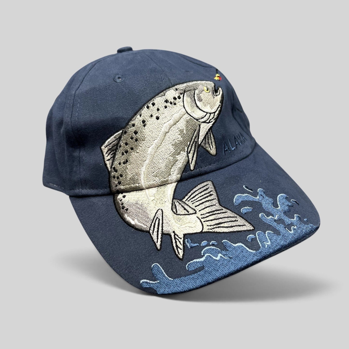 Raree Finds vintage navy cotton strapback hat featuring oversized embroidered rainbow trout and water scene